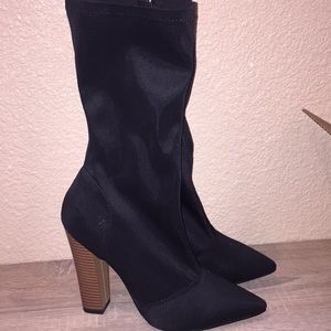 Black pointy her boots